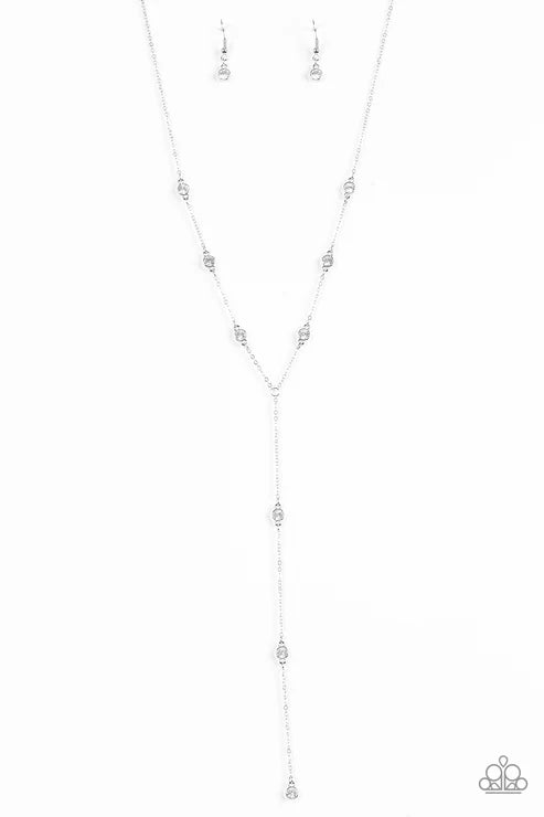Silver necklace and earrings on a white background