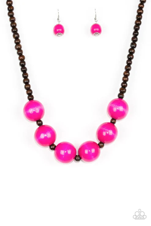Necklace with pink beads and matching earrings on a white background