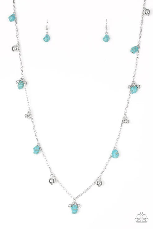 Turquoise beaded necklace and earrings on a white background