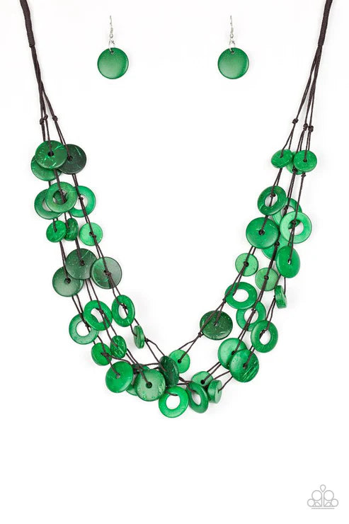 Green button necklace and earrings on a white background
