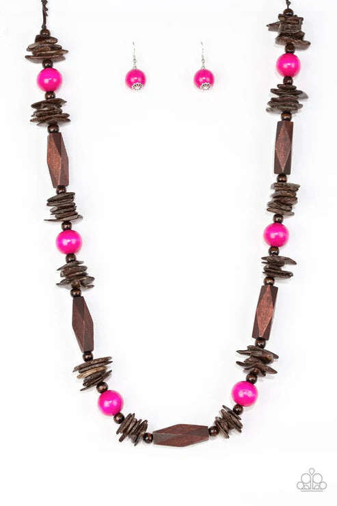 Necklace and earrings with pink beads and brown wooden elements on a white background