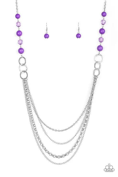 Necklace with purple beads and silver chains on a white background