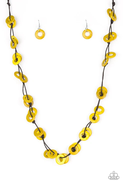 Yellow and black necklace and earrings on a white background