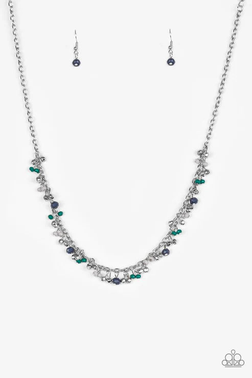 Necklace with green and purple beads on a white background