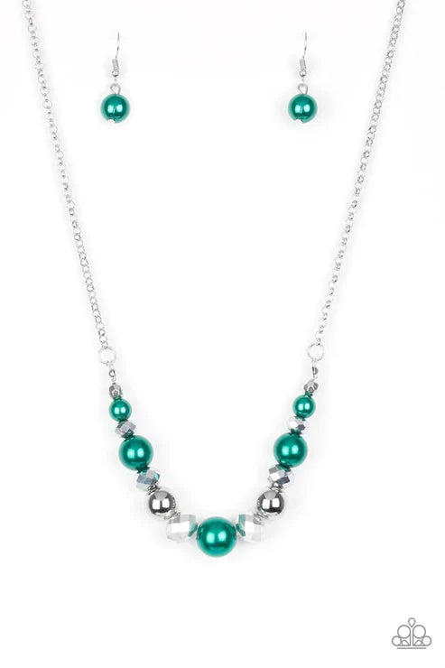 Necklace and earrings set with green and silver beads on a white background