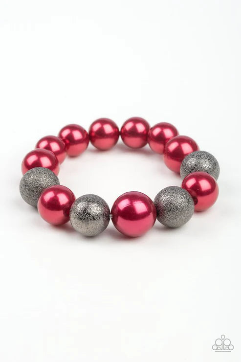 Bracelet with pink and gray beads on a white background