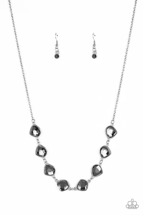 Jewelry set with necklace and earrings on a white background