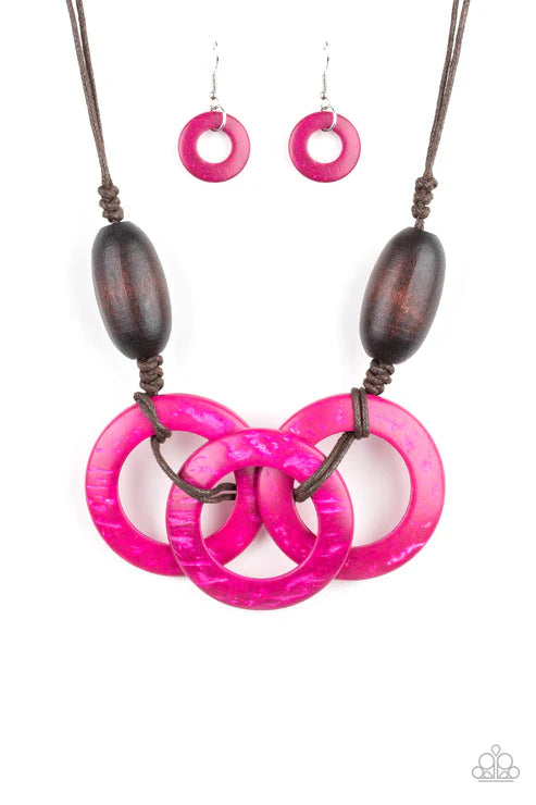 Necklace and earrings set with pink interlocking rings and brown beads on a white background