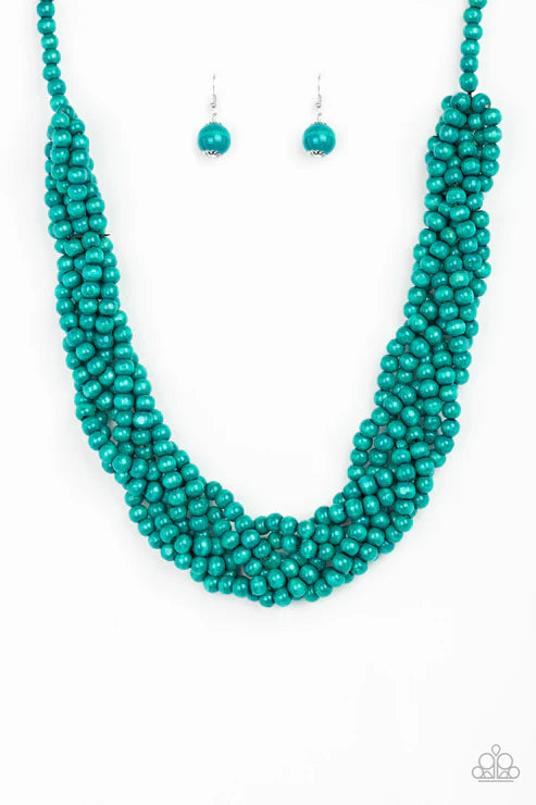Turquoise beaded necklace and earrings on a white background