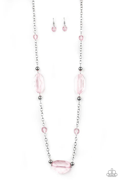 Necklace and earrings set with pink beads on a white background
