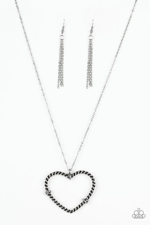 Necklace with a heart-shaped pendant on a white background