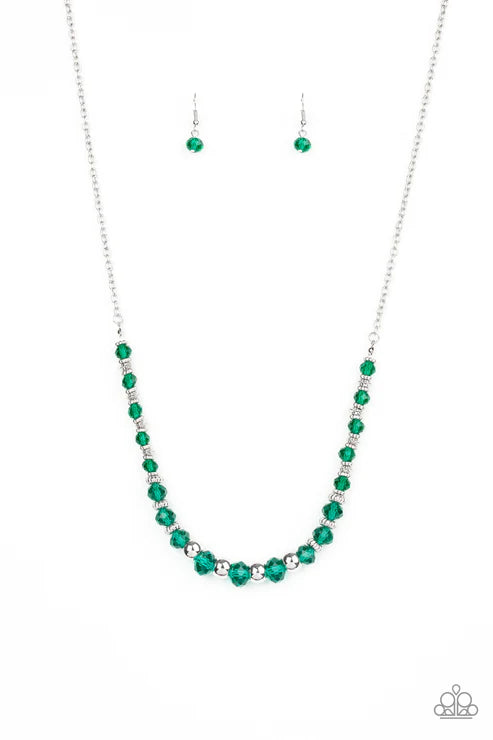 Green beaded necklace and earrings on a white background