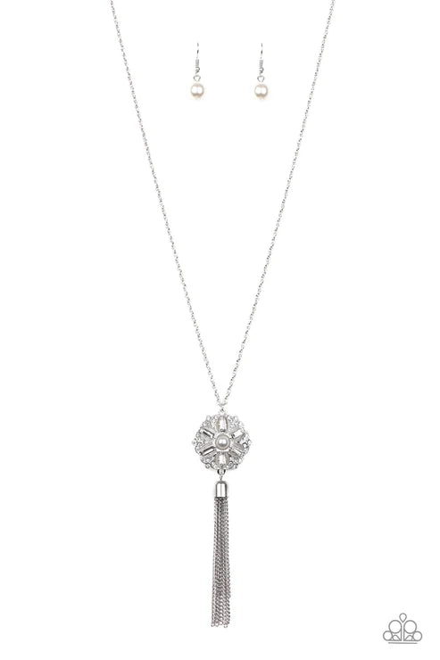 Silver necklace with tassel and matching earrings on a white background