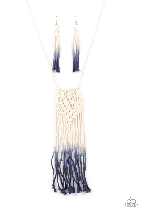 Macrame necklace with blue and white gradient tassels on a white background