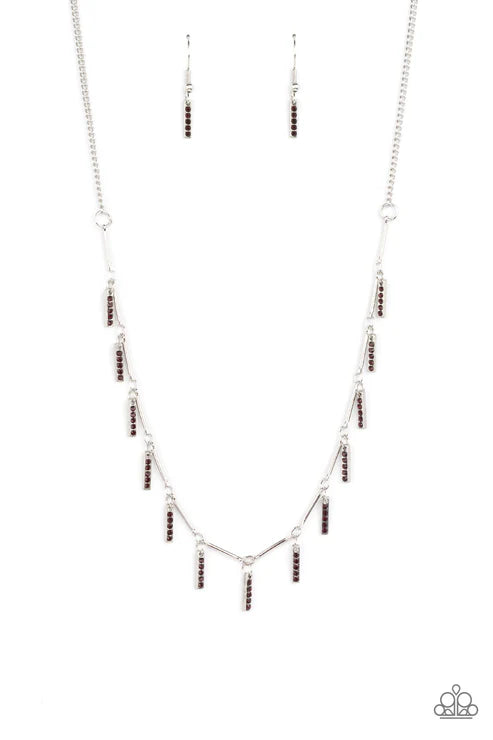 Necklace with red beads on a white background