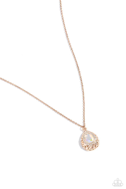 Rose gold necklace with a teardrop-shaped pendant on a white background