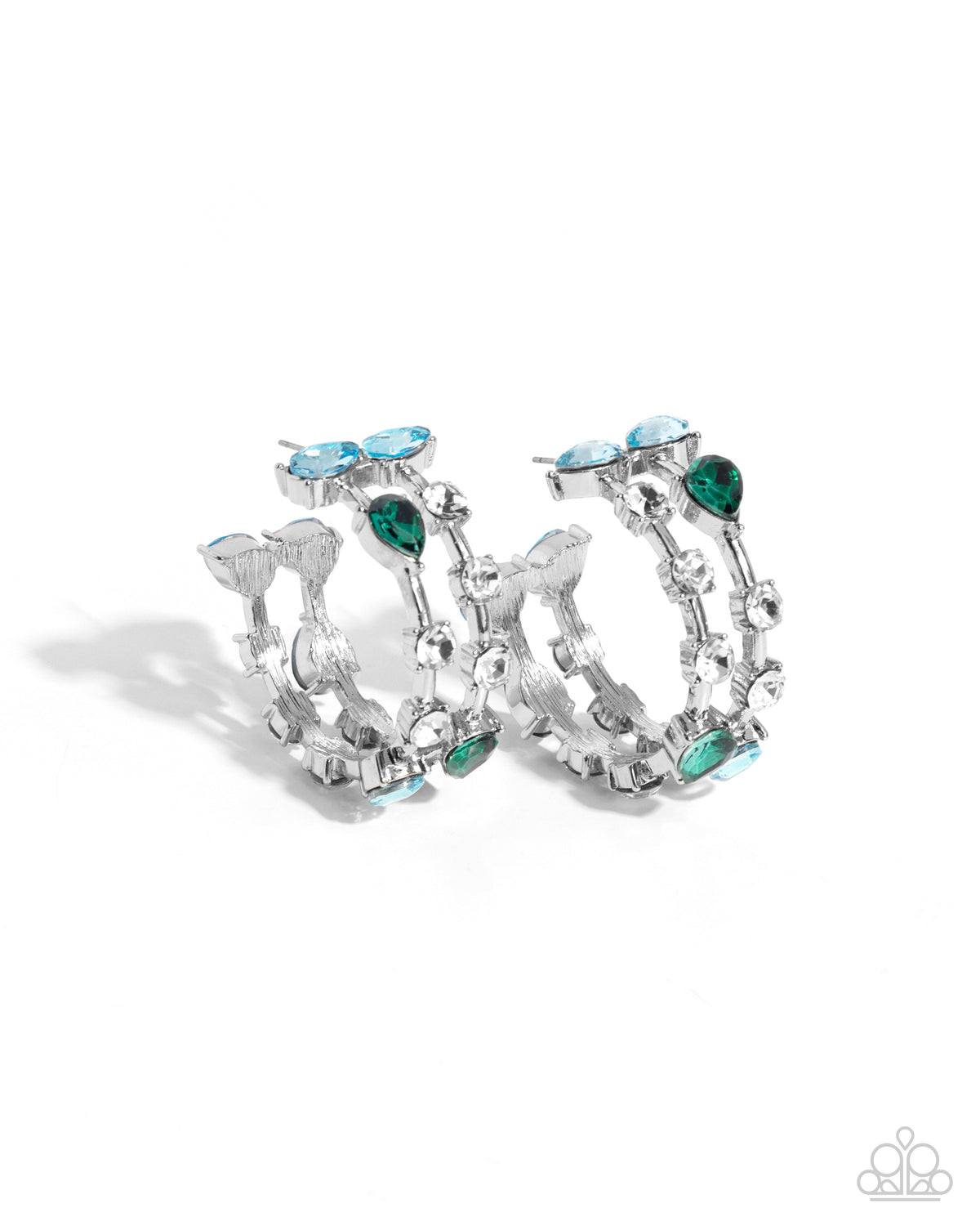 A pair of silver-toned huggie hoop earrings decorated with light blue marquise-cut crystals and green teardrop crystals, shown on a clean white background.