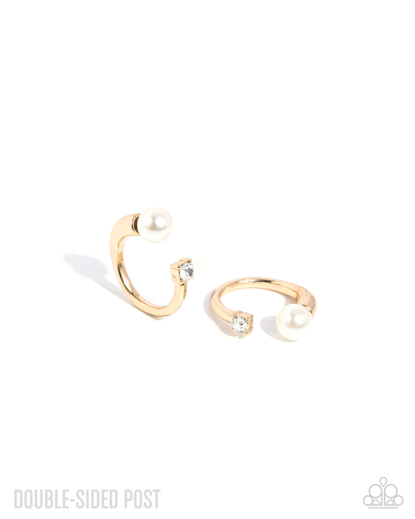 Gold hoop earrings with pearls on a white background