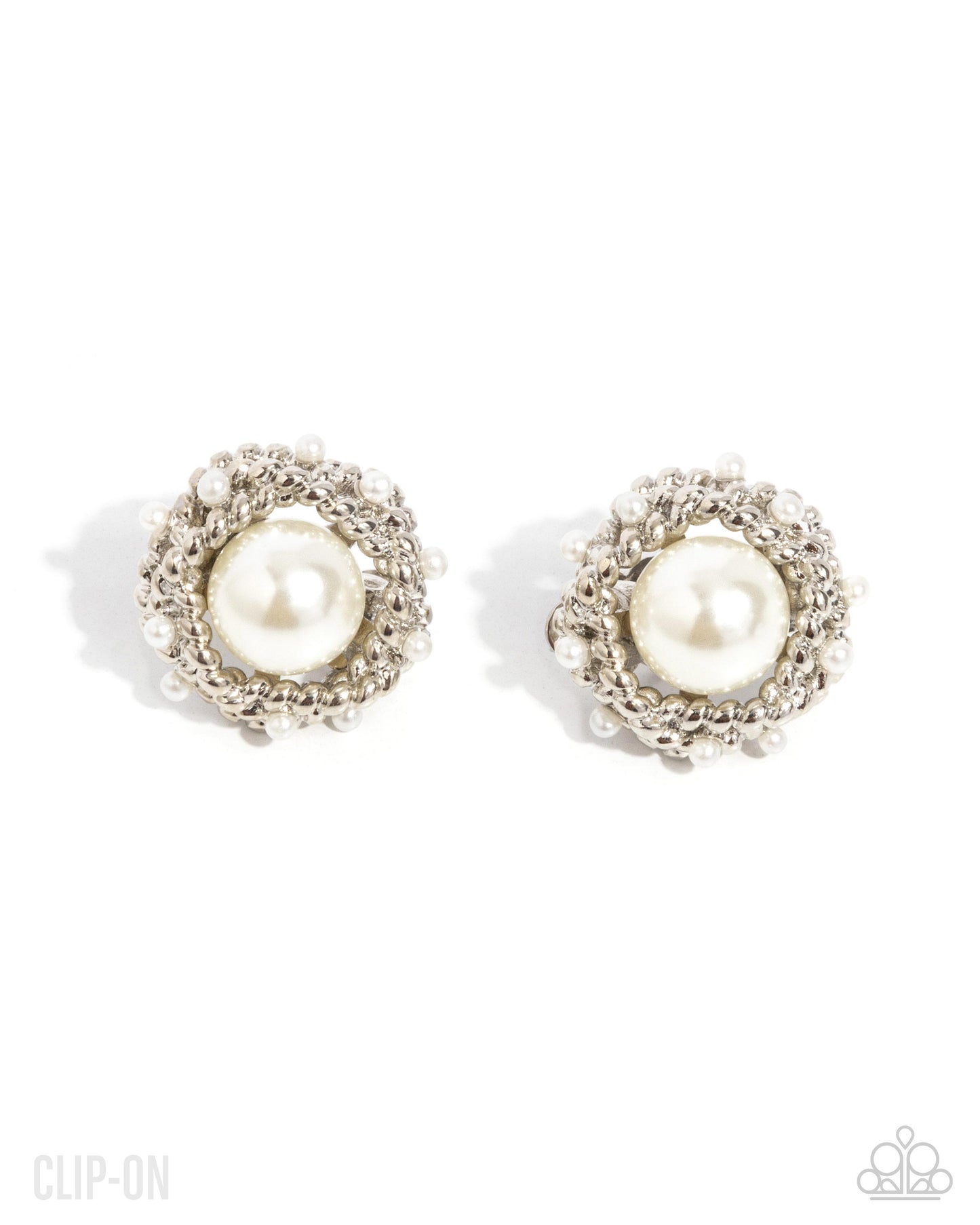 Pair of pearl clip-on earrings on a white background