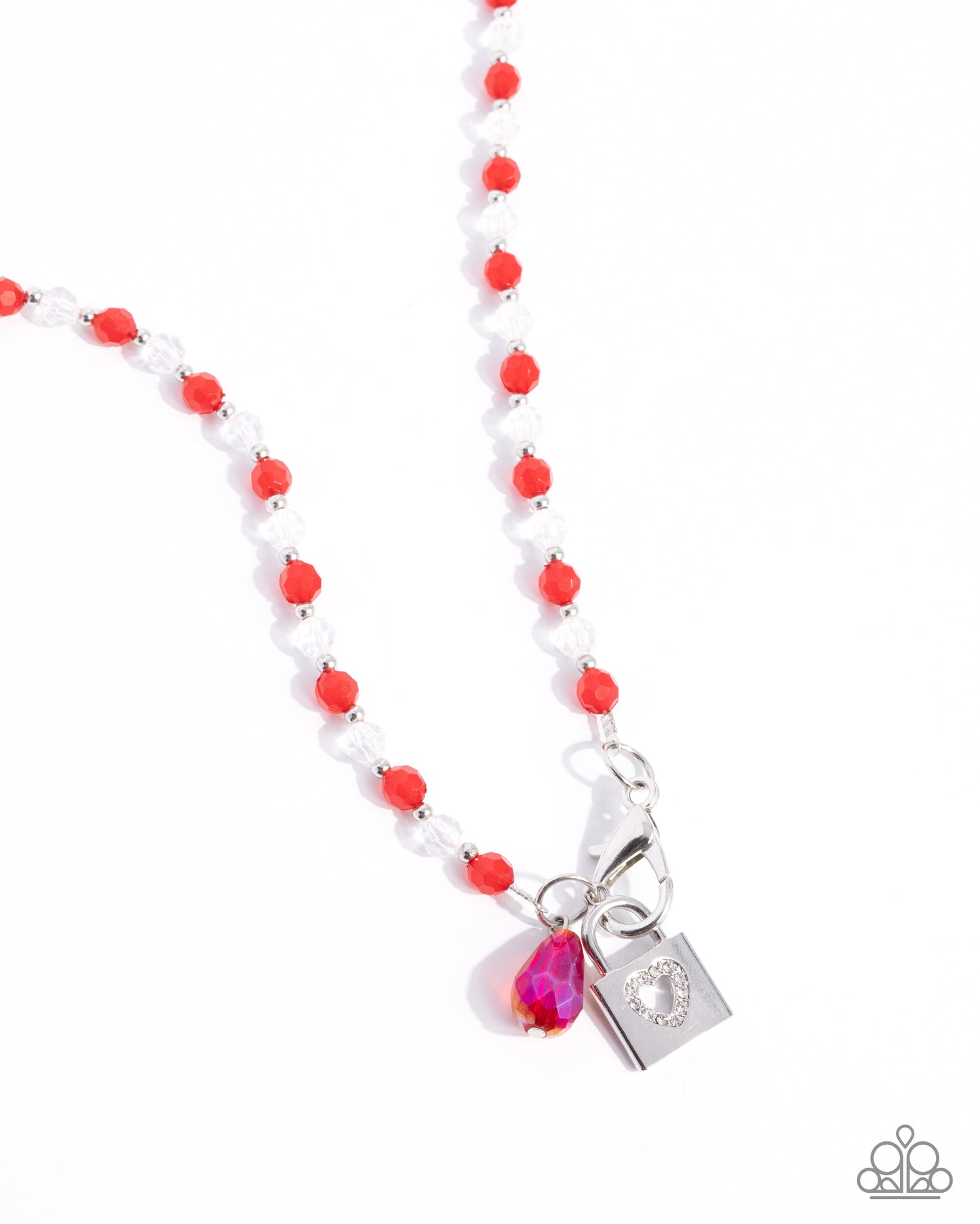 Necklace with red and white beads and a silver bow pendant on a white background