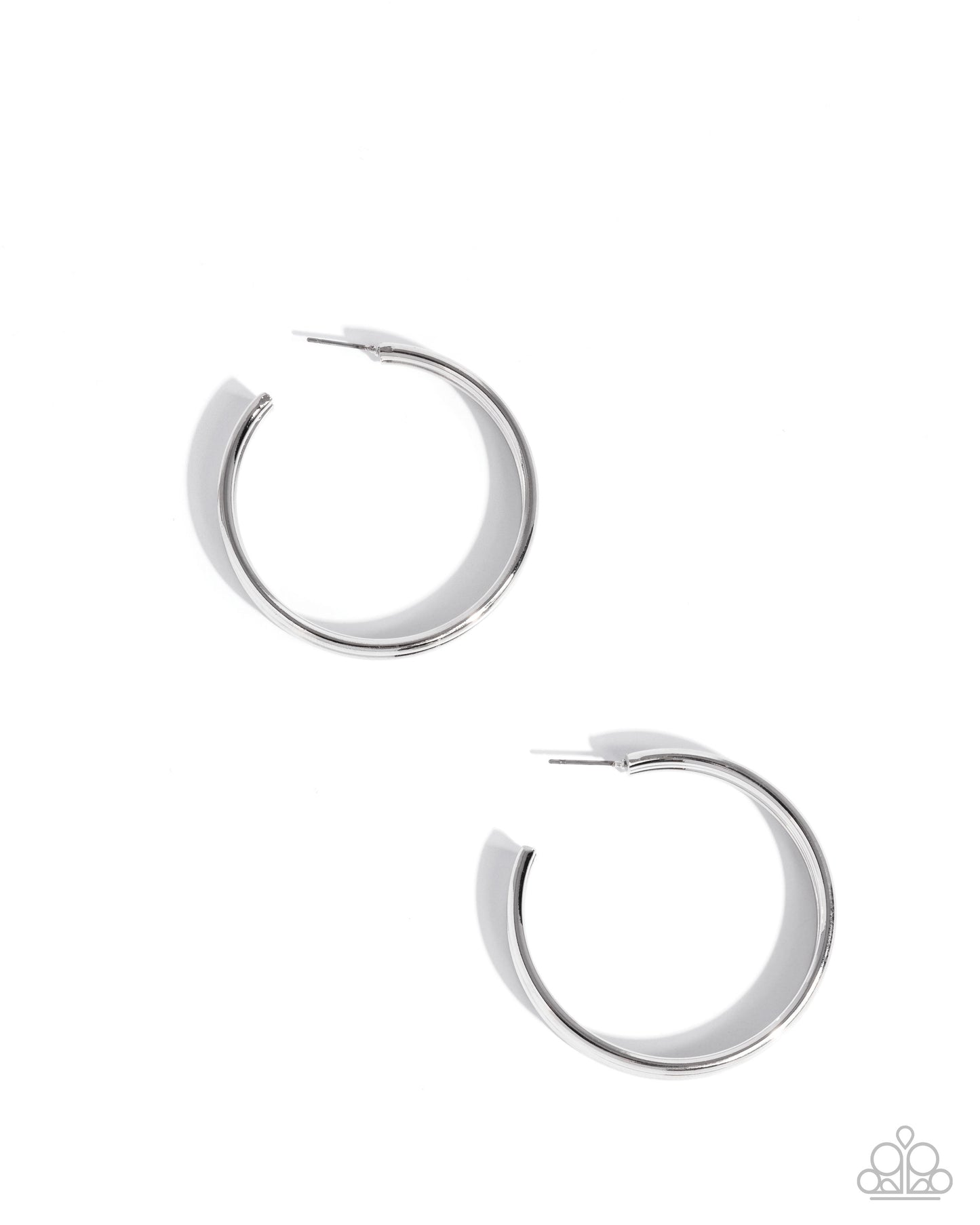 Pair of silver hoop earrings on a white background