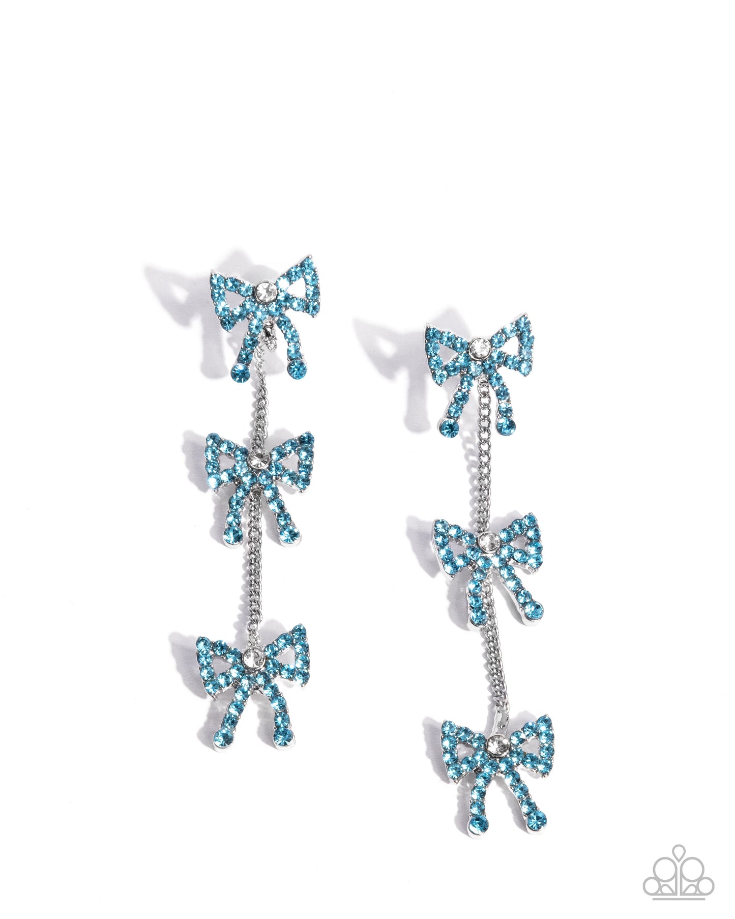 Pair of earrings with blue bow designs on a white background