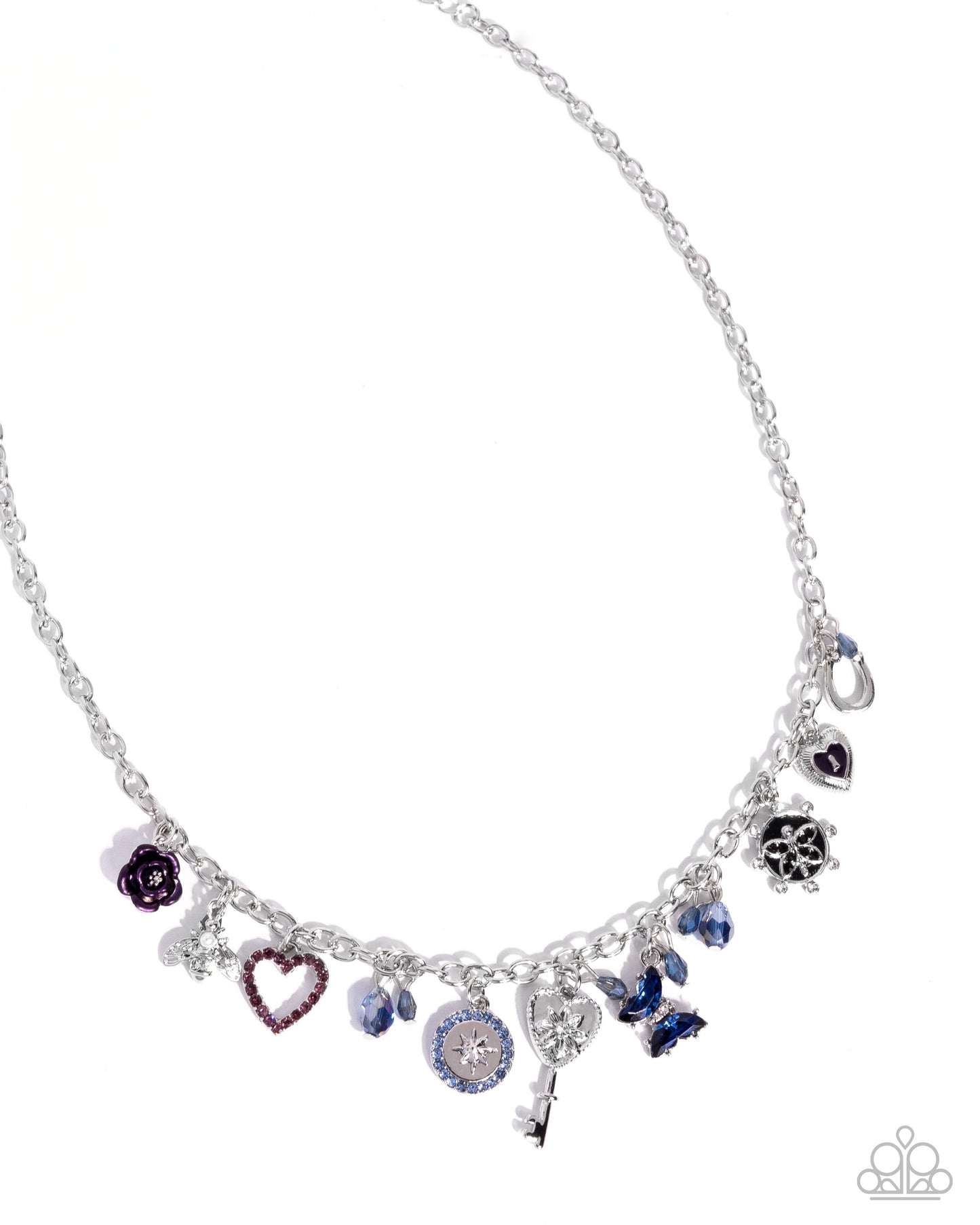 Necklace with various charms on a white background