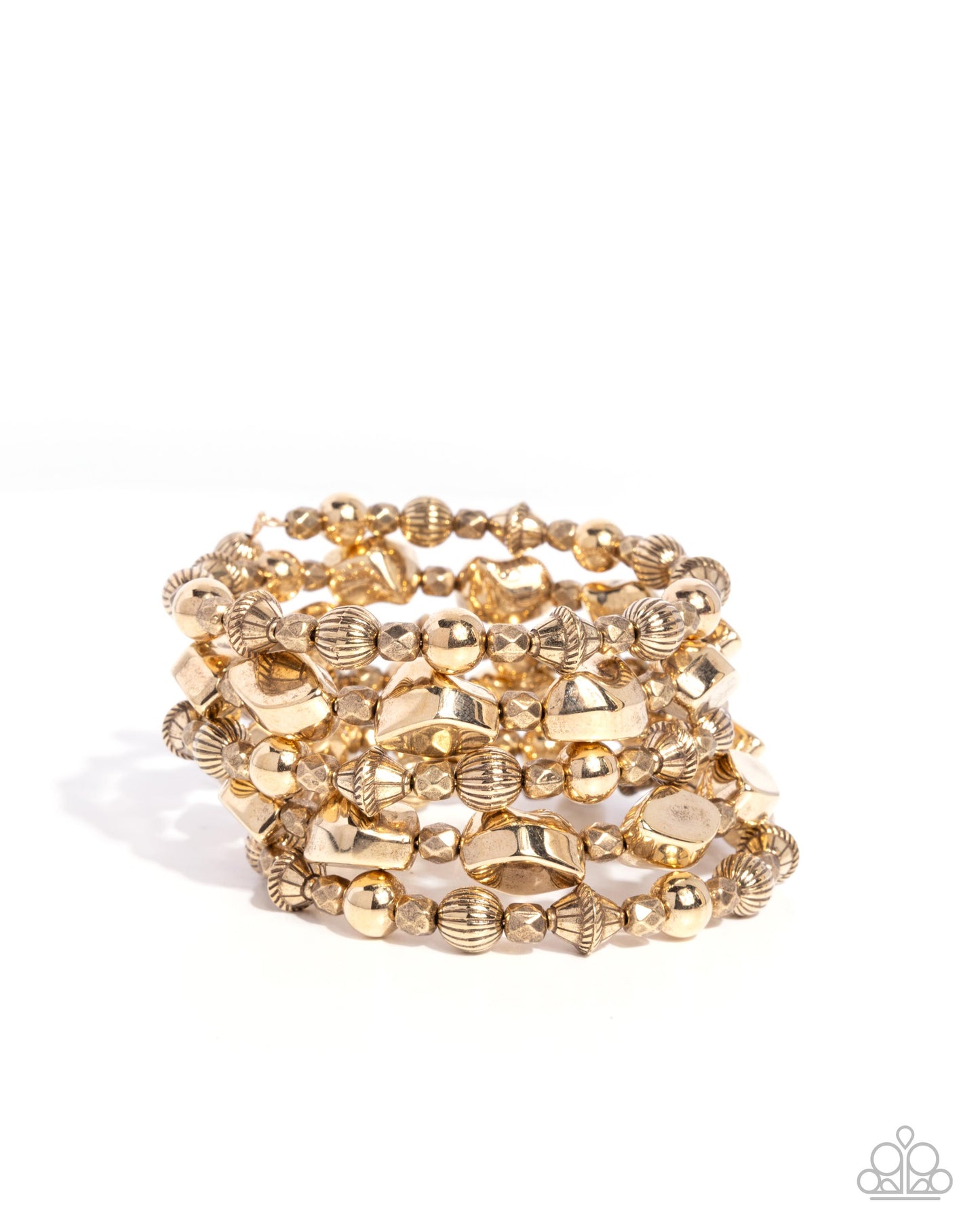 Set of gold beaded bracelets on a white background