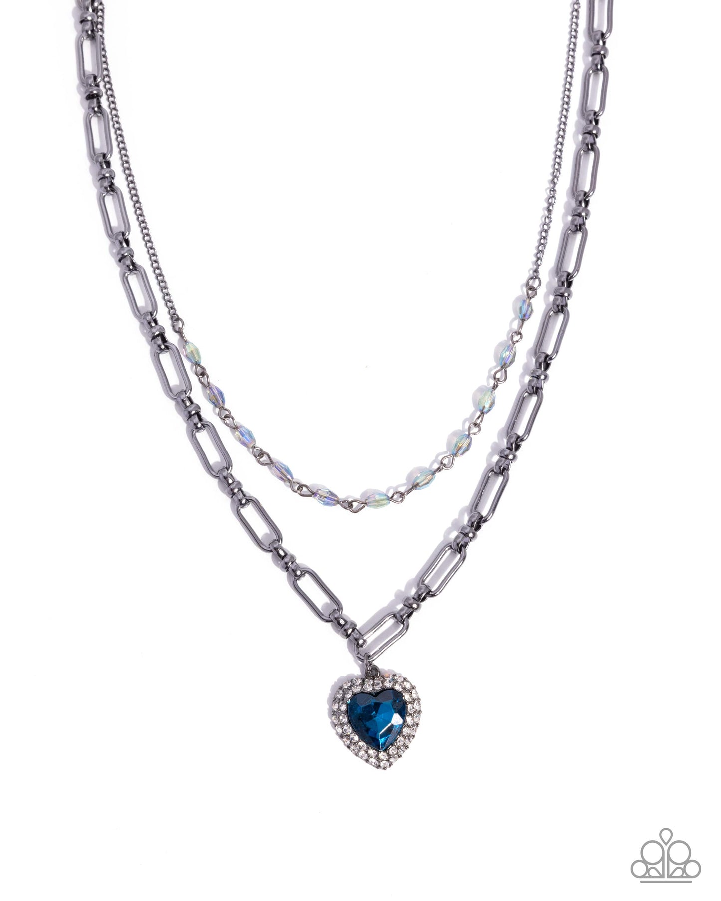 Two layered necklaces with a heart-shaped blue gemstone pendant on a white background