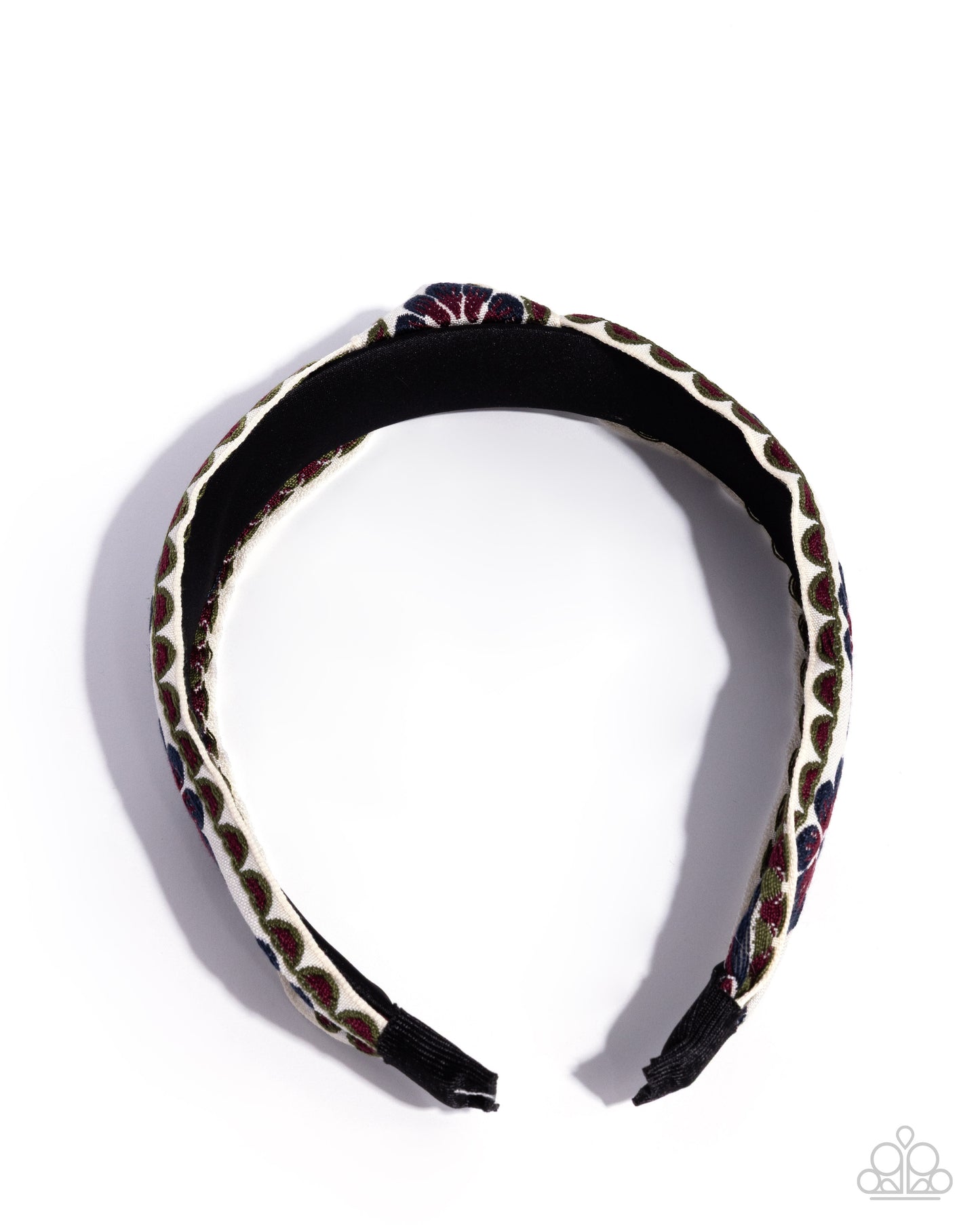 Decorative headband with animal print design on a white background