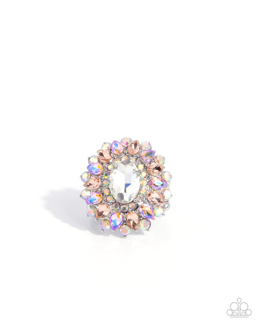 Jewelry ring with multicolored gemstones on a white background