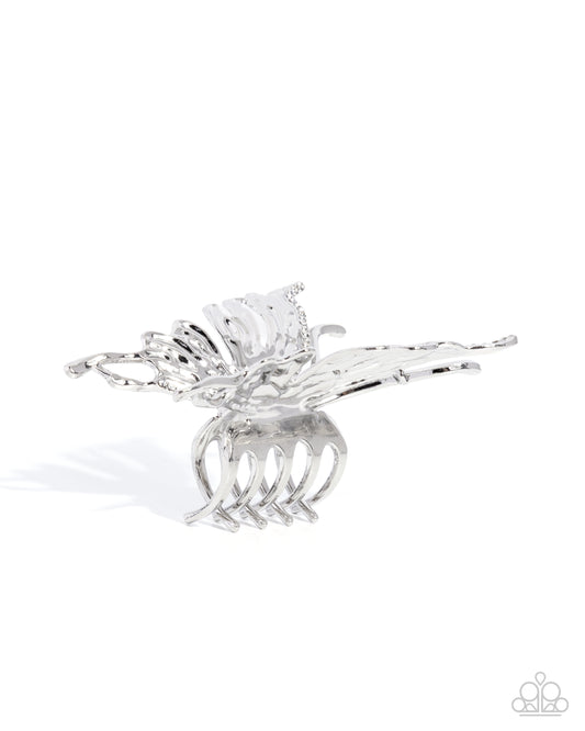 Silver hair clip on a white background