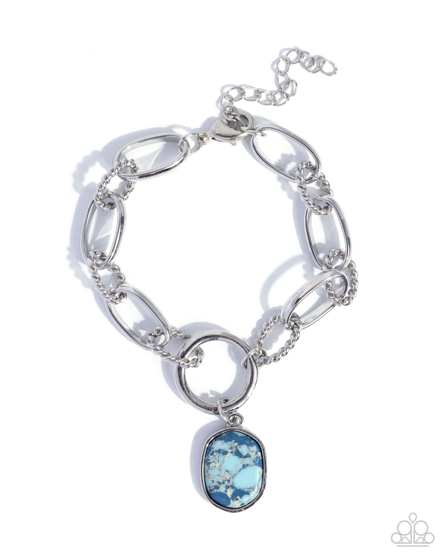 A silver-toned chain bracelet with elongated oval links, a central ring, and a dangling oval charm featuring a blue and white marbled pattern, shown on a white background with a Paparazzi logo watermark in the corner.