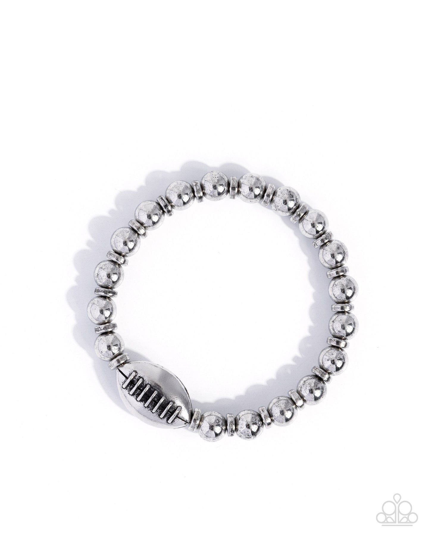 Silver beaded ring with a white band on a white background