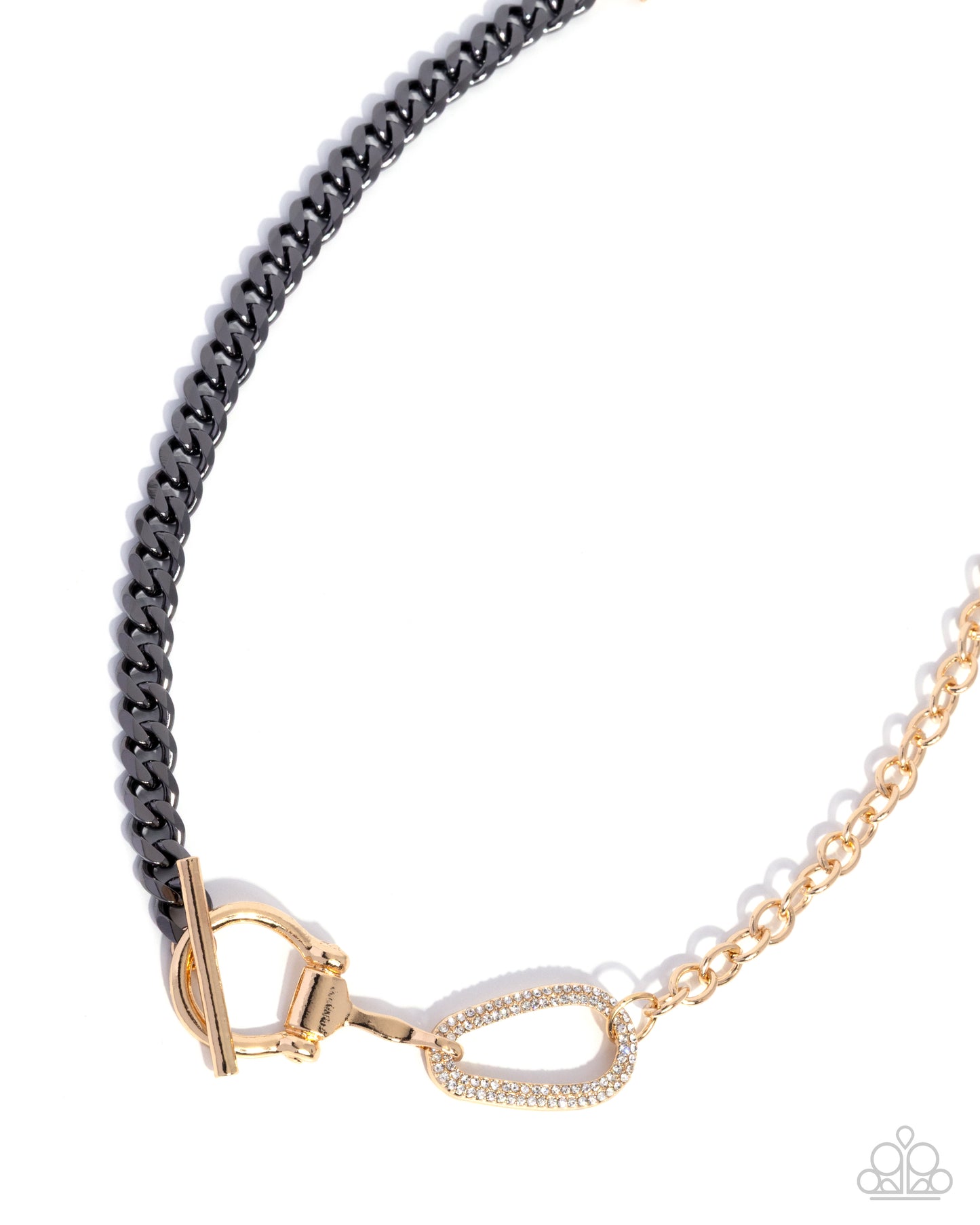 A close-up of a necklace featuring a black curb chain section and a gold chain section, joined by a gold clasp and a small gold heart-shaped charm with a clear stone border, on a white background.