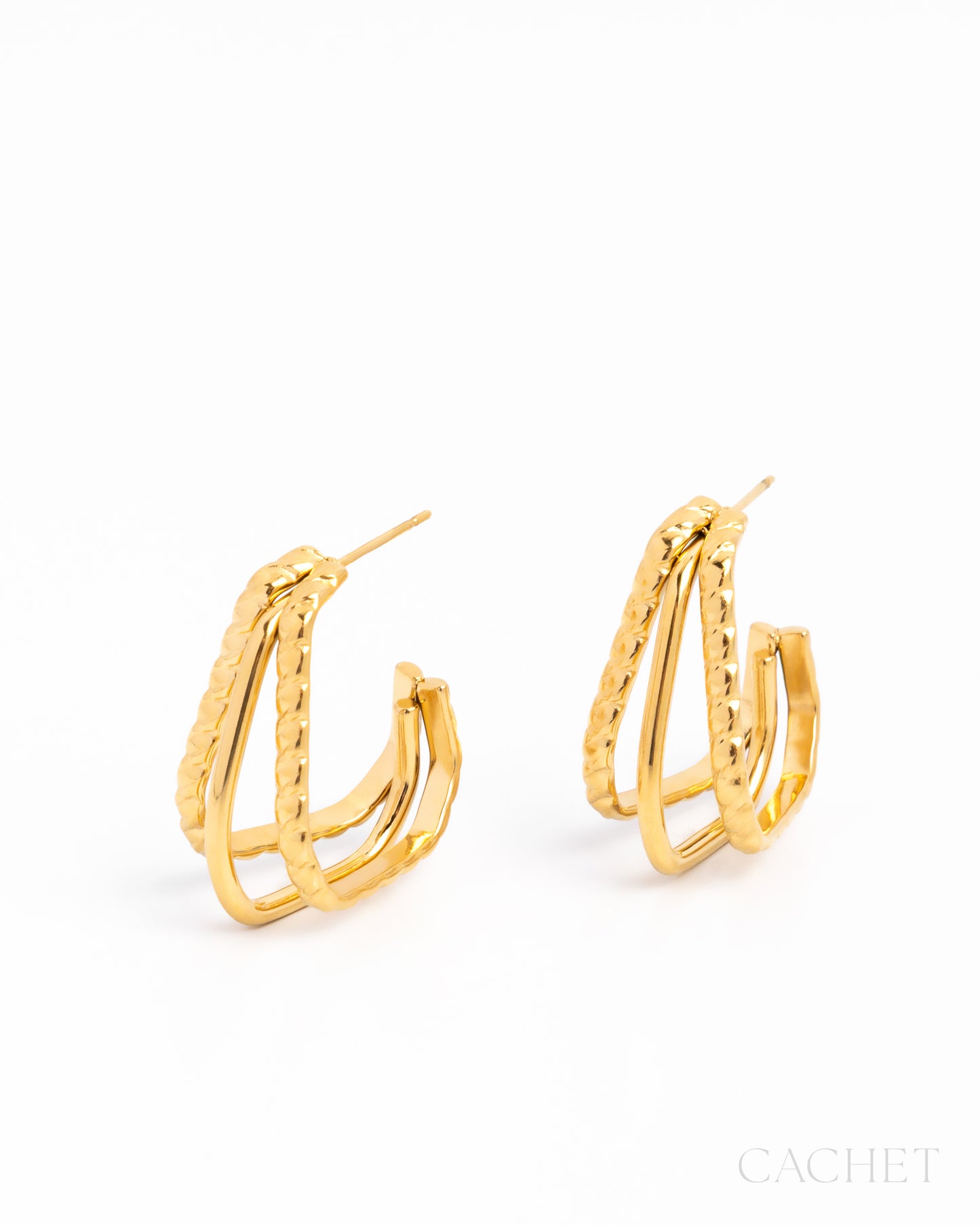 Gold hoop earrings on a white background with 'Cachet' branding.