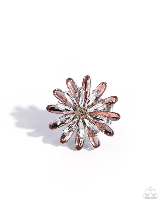 Rose gold and silver flower-shaped earring on a white background