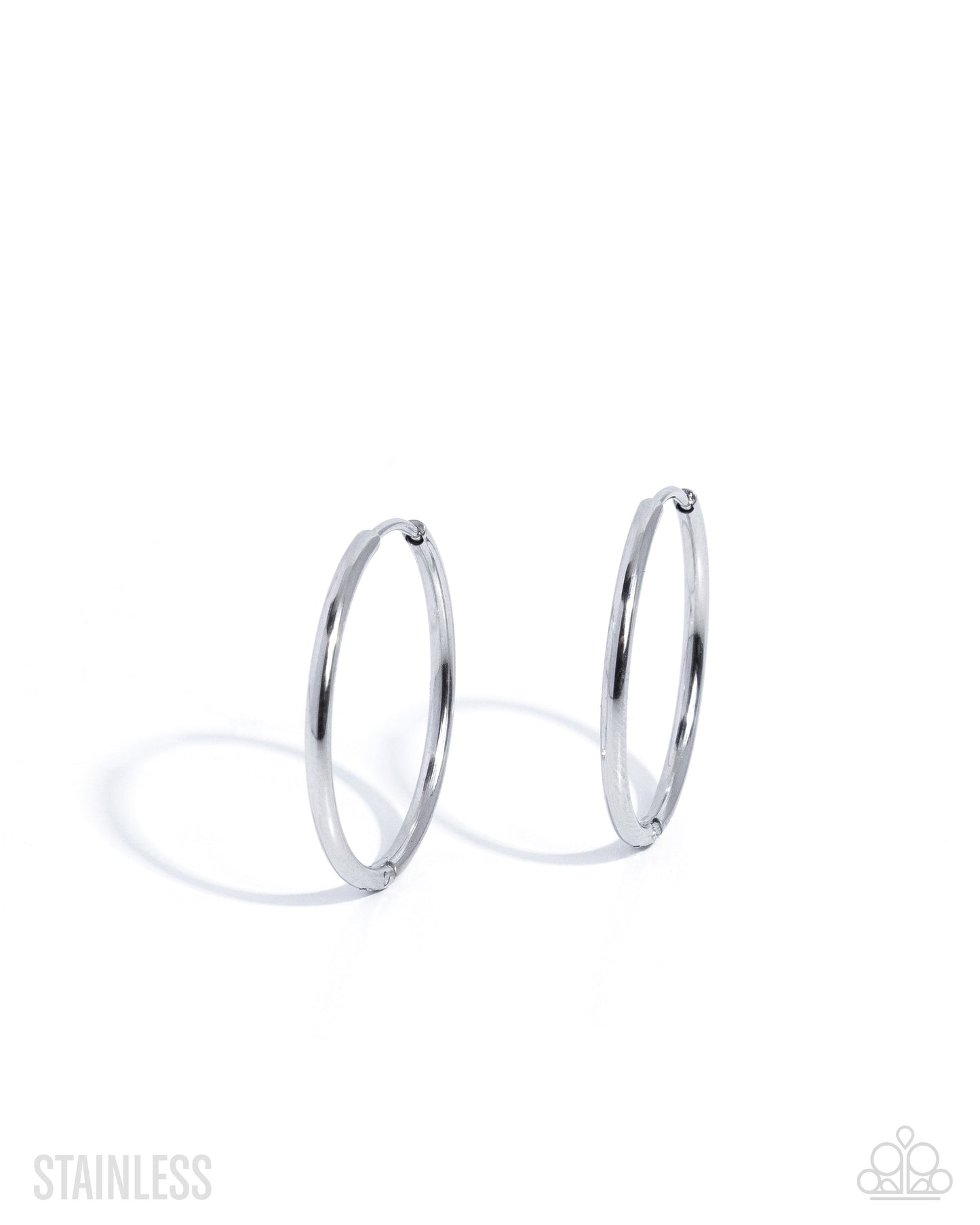 Pair of silver hoop earrings on a white background