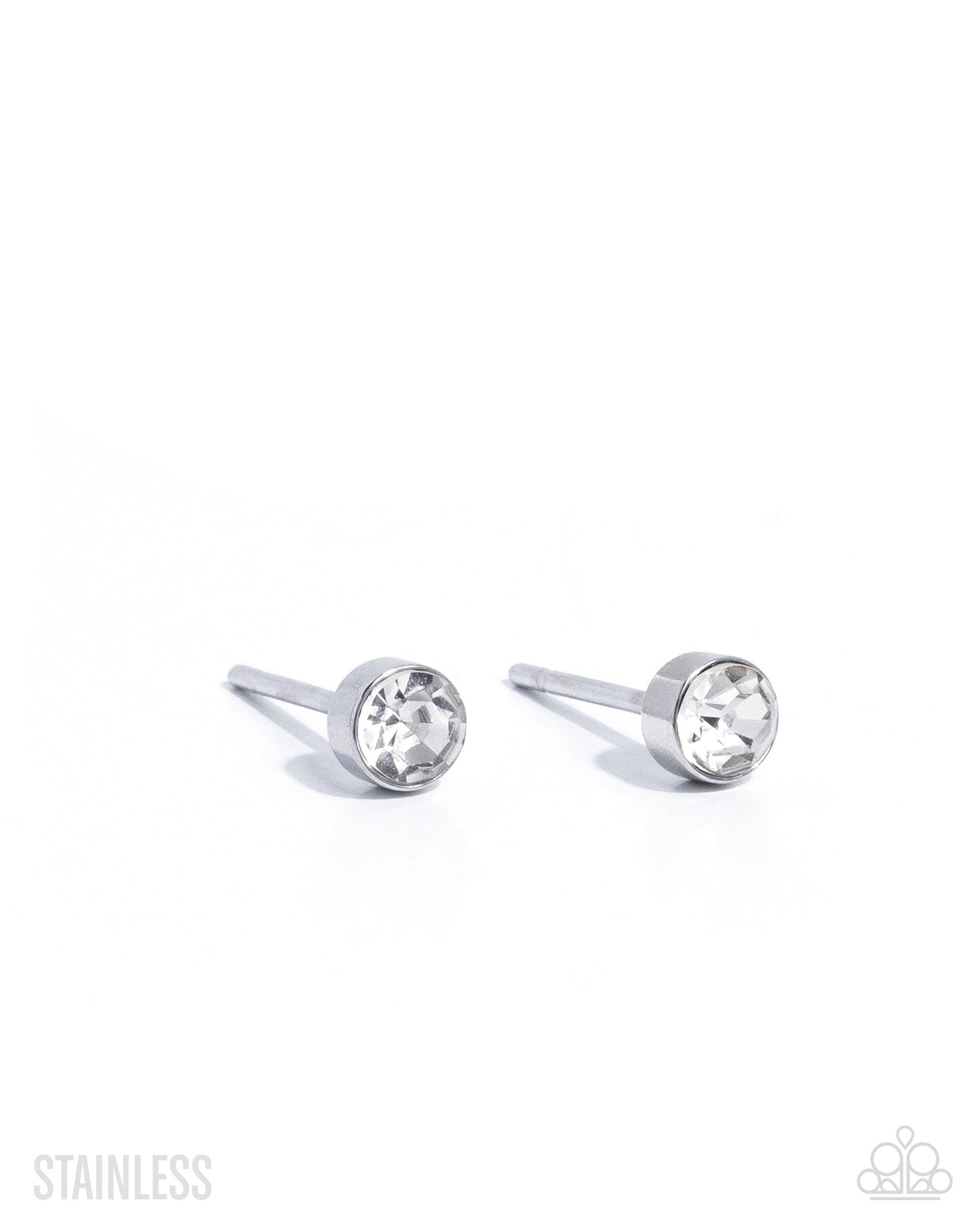 Pair of silver stud earrings with clear gemstones on a white background