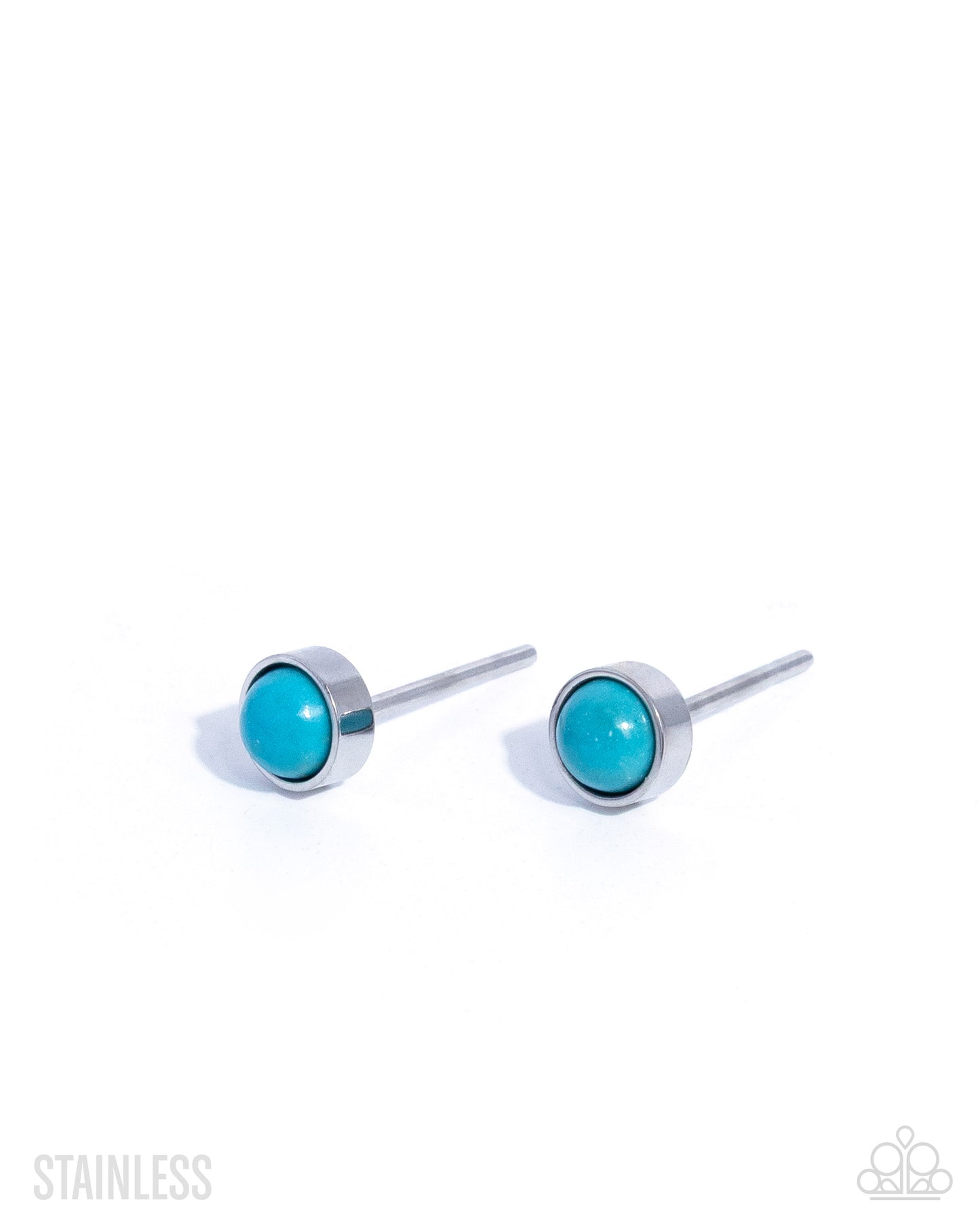 Turquoise stud earrings with silver posts on a white background