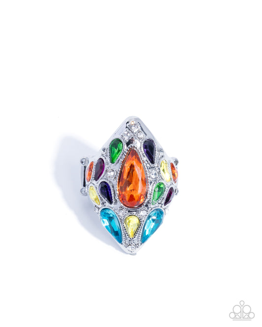 Multicolored gemstone ring with silver band on a white background