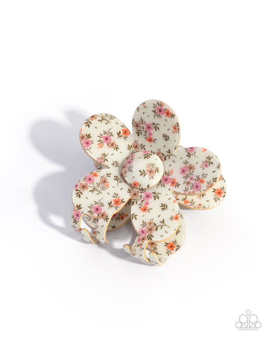 Set of floral ceramic coasters on a white background