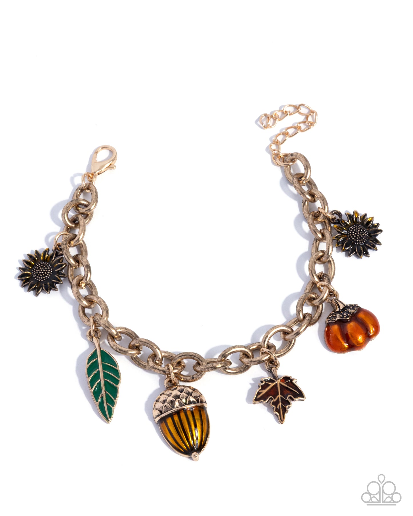 Gold bracelet with autumn-themed charms on a white background