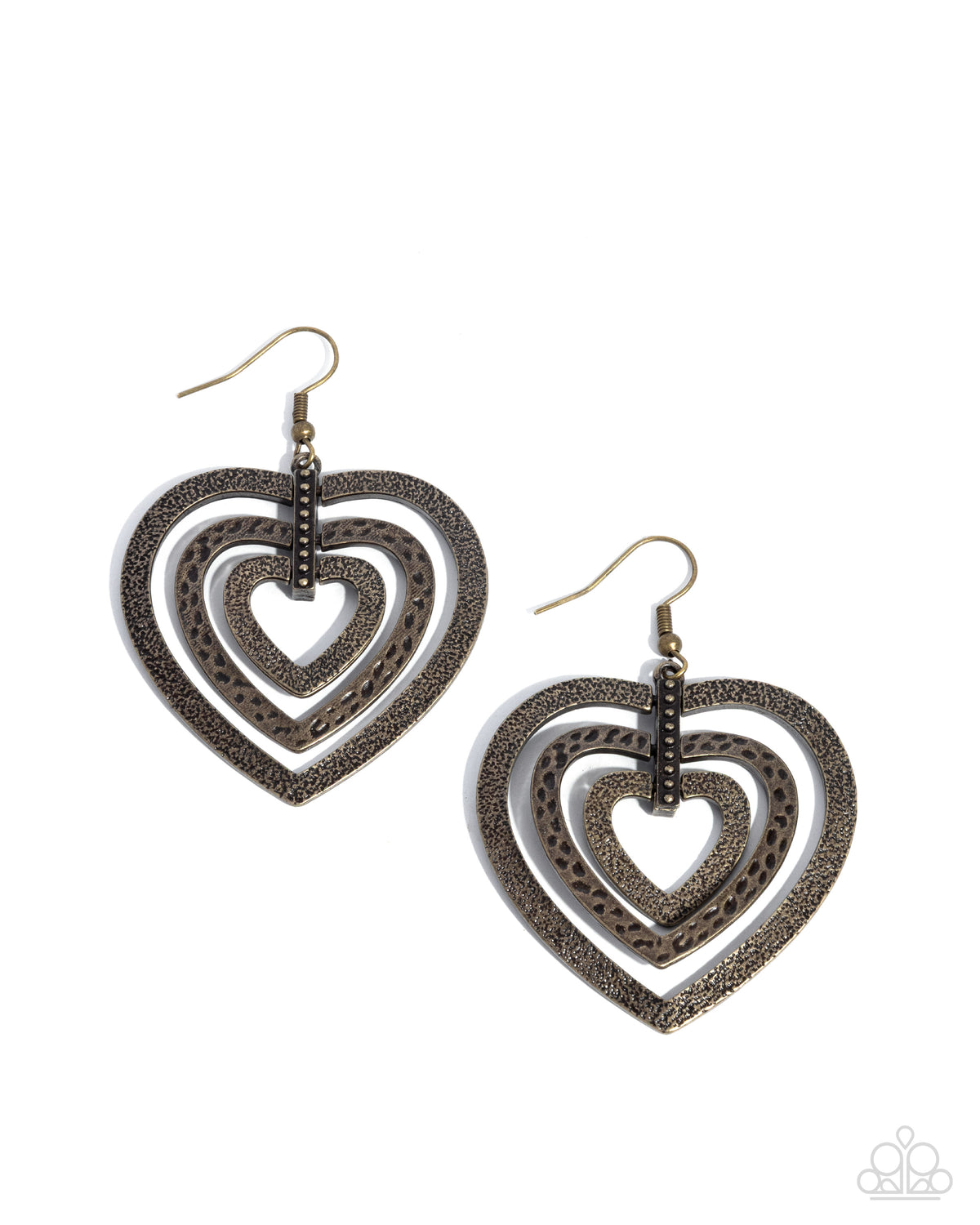 Heart-shaped earrings with intricate designs on a white background