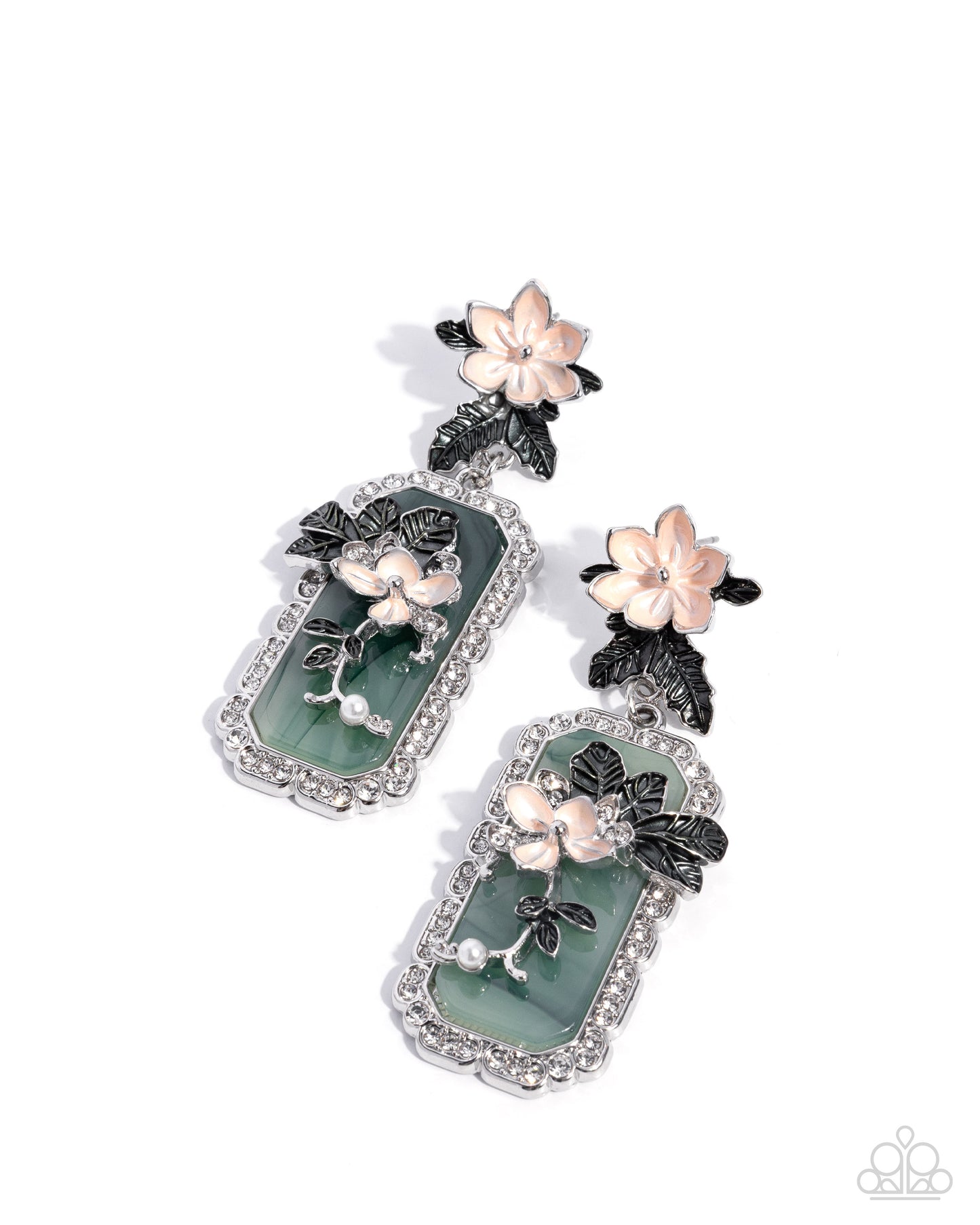 Pair of floral earrings with green accents on a white background