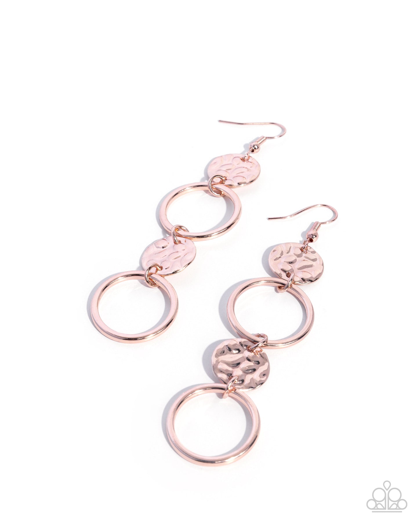 Rose gold circular earrings on a white background