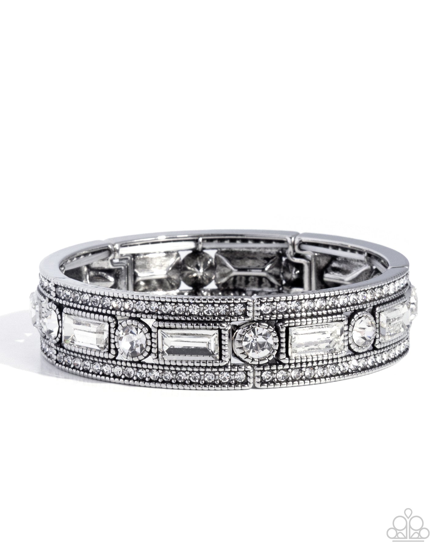 Silver ring with gemstones on a white background