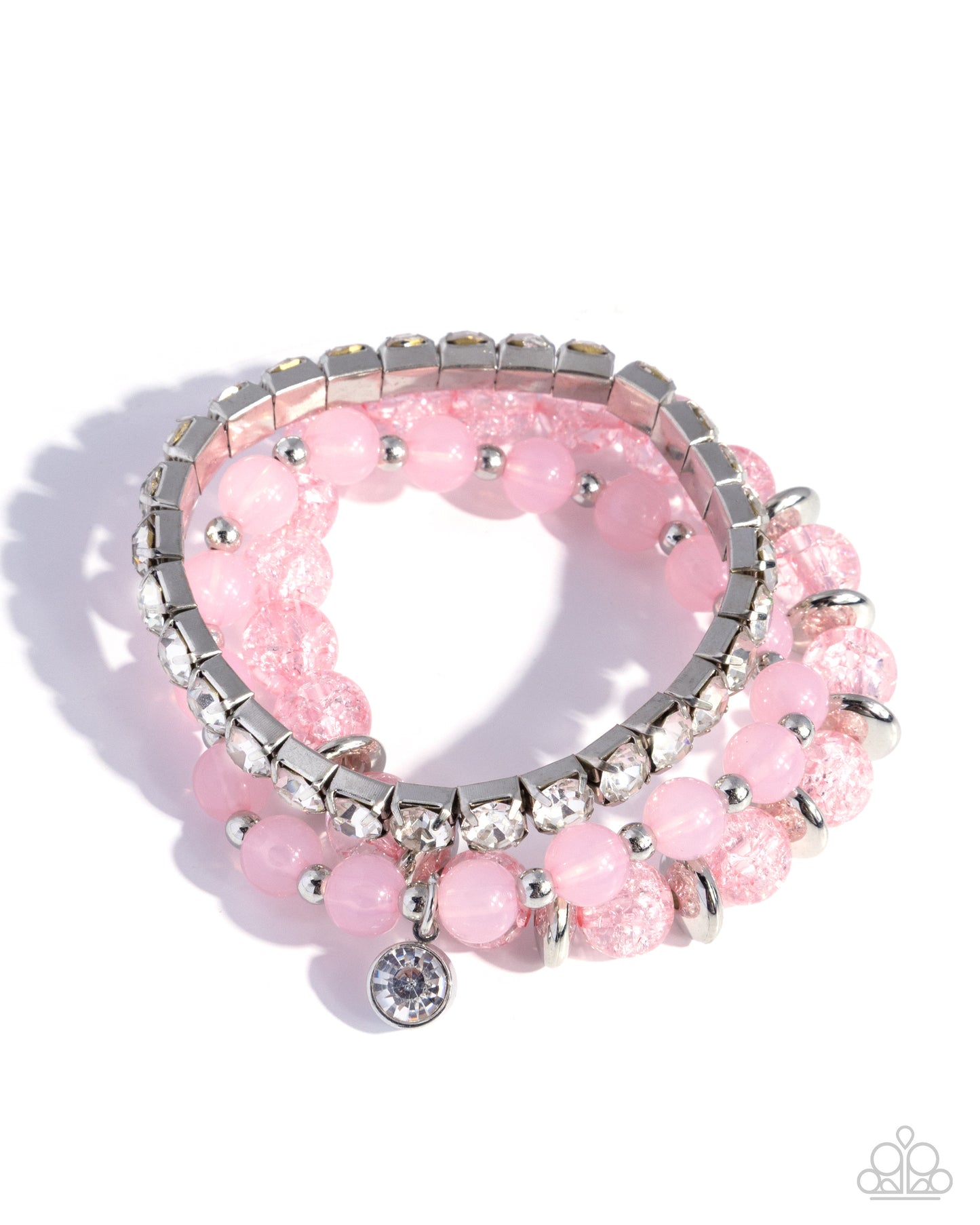 Pink beaded bracelet with silver accents on a white background