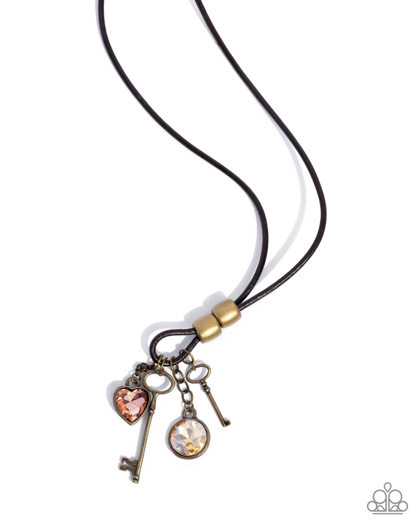 Necklace with heart, key, and round charm on a white background