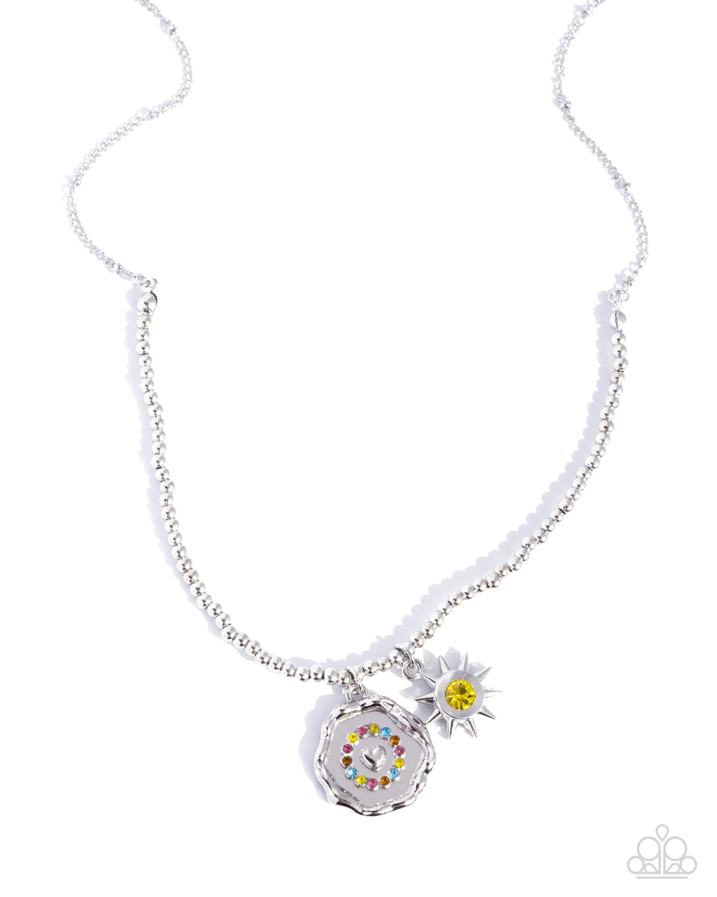 Necklace with a colorful pendant and white flower charm on a white background
